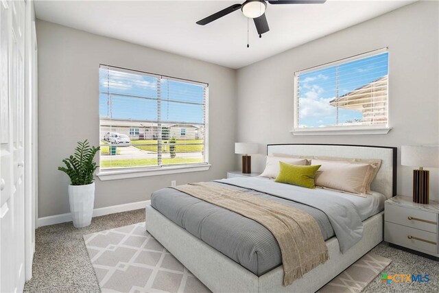 211 Balboa Dr, Universal City, TX 78148 - bedroom with carpet flooring and a ceiling fan