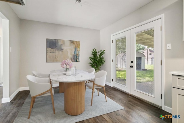 211 Balboa Dr, Universal City, TX 78148 - dining room featuring dark wood-style floors and french doors