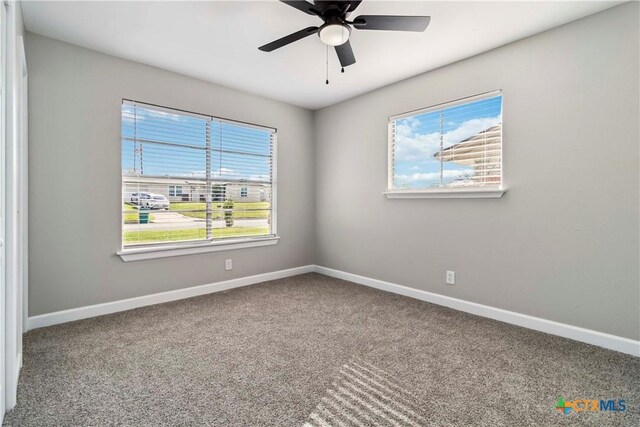 211 Balboa Dr, Universal City, TX 78148 - unfurnished room featuring carpet flooring and a ceiling fan