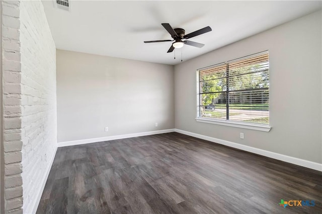 211 Balboa Dr, Universal City, TX 78148 - empty room with dark wood-style flooring and a ceiling fan