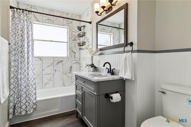 211 Balboa Dr, Universal City, TX 78148 - bathroom featuring shower / tub combo, vanity, and wood finished floors