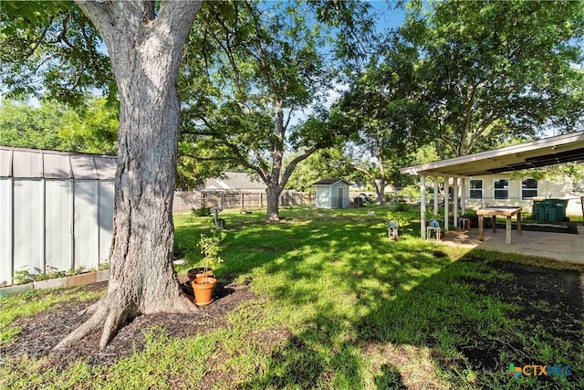 211 Balboa Dr, Universal City, TX 78148 - fenced backyard with a storage shed and a patio