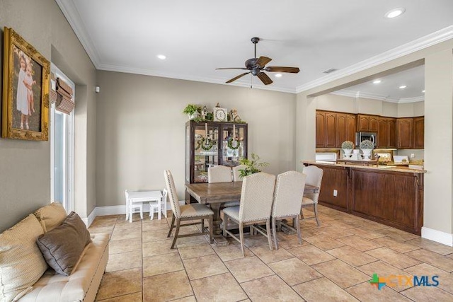 3 Sago Dr, Port Lavaca, TX 77979 - dining space featuring a ceiling fan, recessed lighting, baseboards, and crown molding