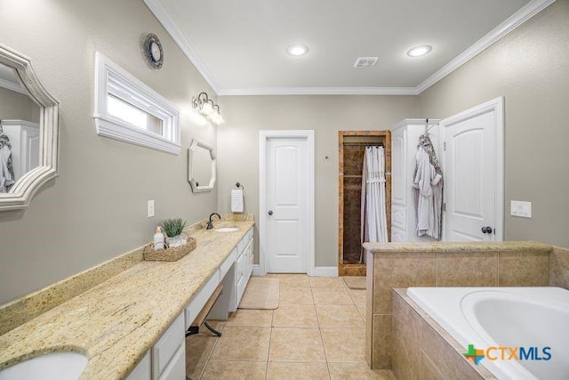 3 Sago Dr, Port Lavaca, TX 77979 - full bathroom featuring double vanity, crown molding, a garden tub, a tile shower, and tile patterned flooring