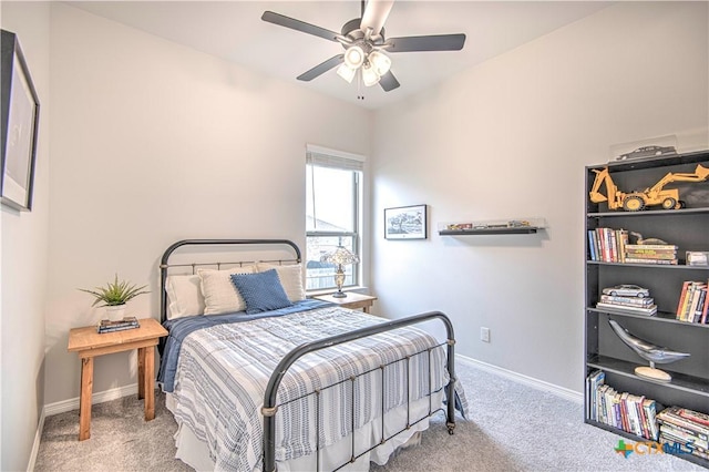 bedroom with light colored carpet and ceiling fan