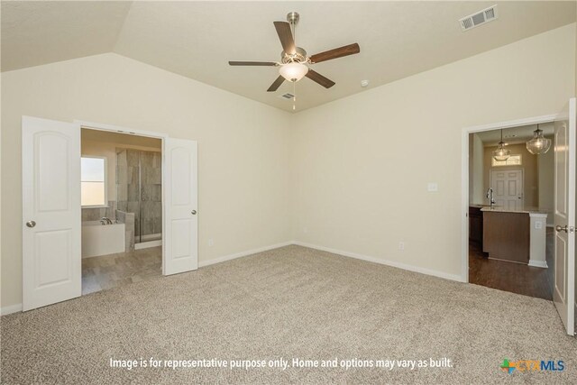 161 Arvil Dr, Killeen, TX 76542 - unfurnished bedroom featuring dark colored carpet, baseboards, vaulted ceiling, and ensuite bath