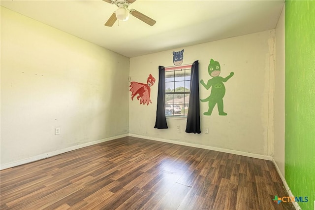 123 Burnet St, Port Lavaca, TX 77979 - unfurnished room with wood finished floors, ceiling fan, and baseboards