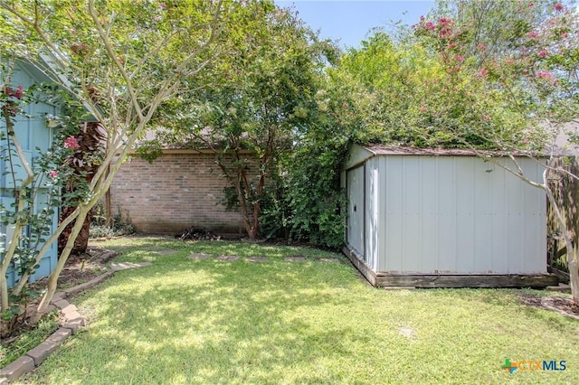 505 Cabana Dr, Victoria, TX 77901 - fenced backyard featuring a storage shed