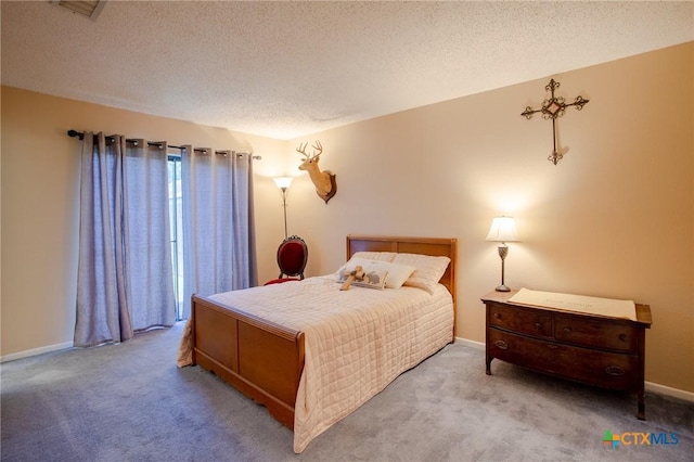 505 Cabana Dr, Victoria, TX 77901 - bedroom with carpet floors and a textured ceiling