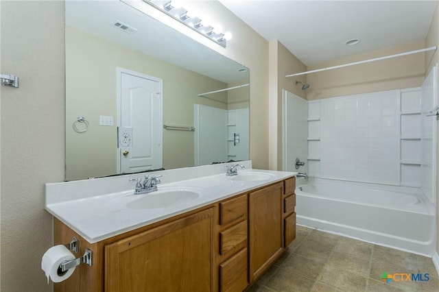 full bathroom with shower / washtub combination, visible vents, a sink, and double vanity