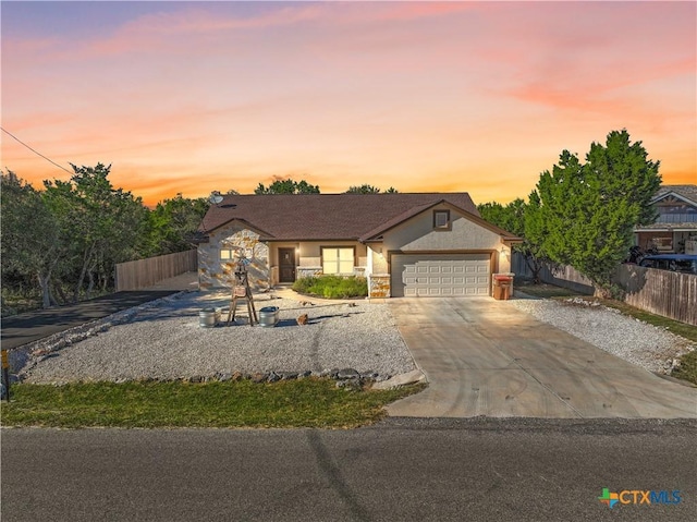 view of front of property with a garage