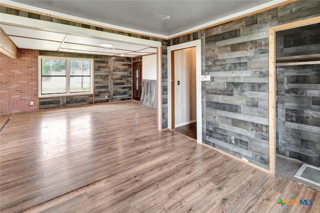 116 N Ben Wilson St, Victoria, TX 77901 - spare room featuring wood finished floors