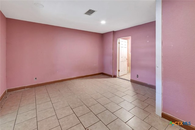 116 N Ben Wilson St, Victoria, TX 77901 - empty room featuring light tile patterned floors and recessed lighting