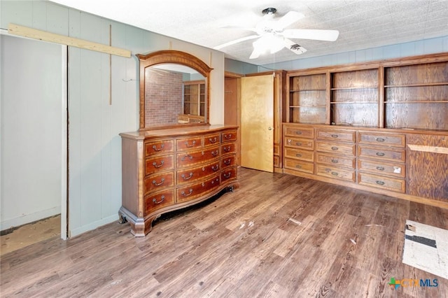 116 N Ben Wilson St, Victoria, TX 77901 - bedroom with wood finished floors, a closet, and ceiling fan