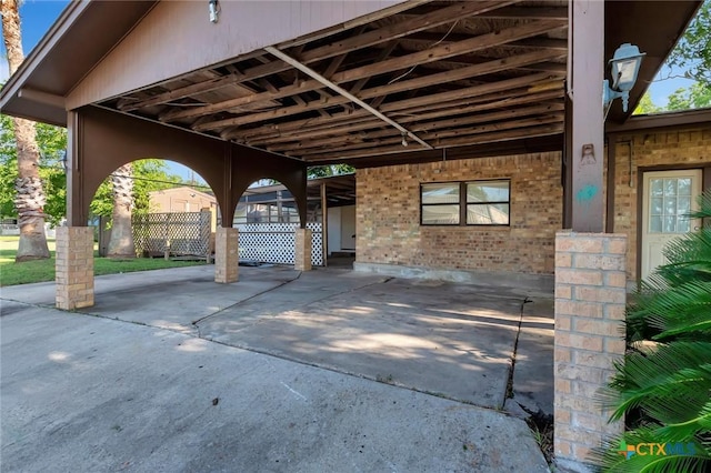 116 N Ben Wilson St, Victoria, TX 77901 - view of patio featuring a carport