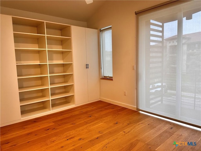 unfurnished room featuring light wood-type flooring