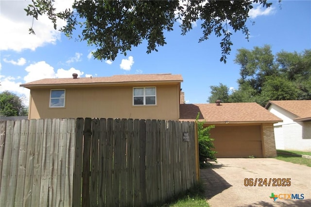 2101 Stagecoach Trl, Temple, TX 76502 - view of side of property with a garage