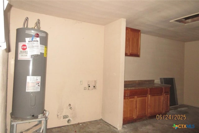 2101 Stagecoach Trl, Temple, TX 76502 - utility room featuring water heater