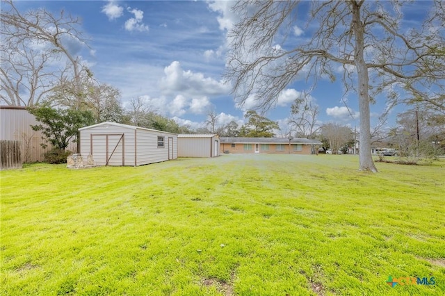 view of yard with a storage shed