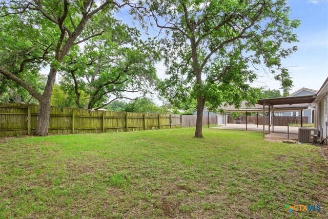 413 S Tyler St, Mcgregor, TX 76657 - view of yard with central air condition unit and a patio area