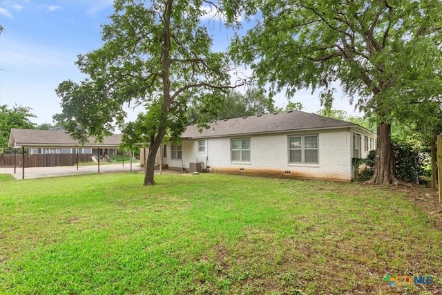413 S Tyler St, Mcgregor, TX 76657 - back of property featuring central AC unit and brick siding