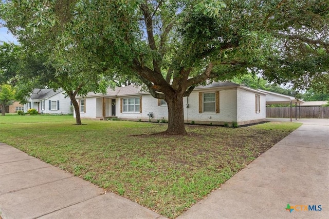 413 S Tyler St, Mcgregor, TX 76657 - view of front of home with an attached carport and concrete driveway