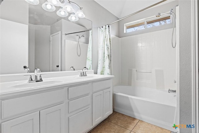 bathroom with tile patterned flooring, vanity, lofted ceiling, and shower / tub combo