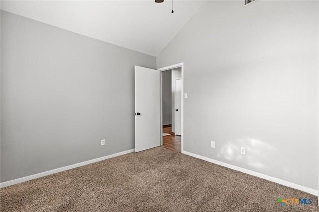 unfurnished room featuring carpet flooring, ceiling fan, and high vaulted ceiling