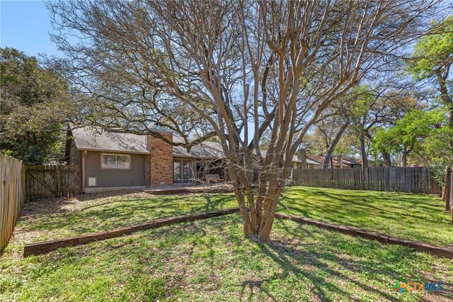 5004 Powder River Rd, Austin, TX 78759 - view of yard with a patio area and a fenced backyard