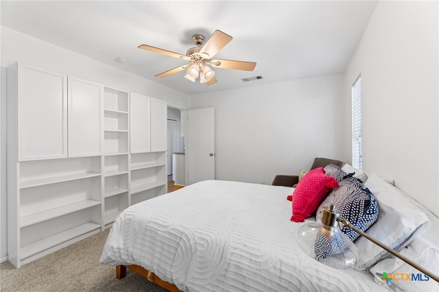5004 Powder River Rd, Austin, TX 78759 - bedroom with visible vents, light carpet, and ceiling fan