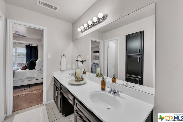 bathroom featuring vanity and tile patterned floors