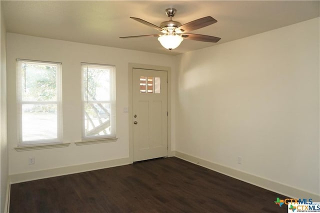 1017/1019 Haynes St Unit 7, San Marcos, TX 78666 - entrance foyer with dark wood-style floors, a ceiling fan, and baseboards