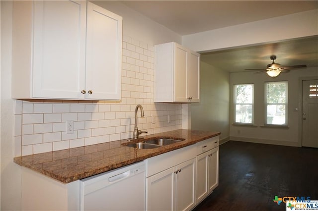 1017/1019 Haynes St Unit 7, San Marcos, TX 78666 - kitchen featuring dishwasher, a sink, white cabinetry, dark stone counters, and tasteful backsplash