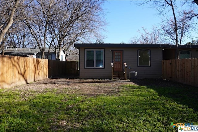 1017/1019 Haynes St Unit 7, San Marcos, TX 78666 - back of property featuring entry steps and central AC unit