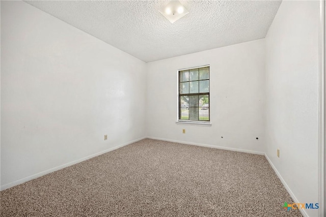312 Saddle Dr, Copperas Cove, TX 76522 - spare room featuring carpet flooring and a textured ceiling