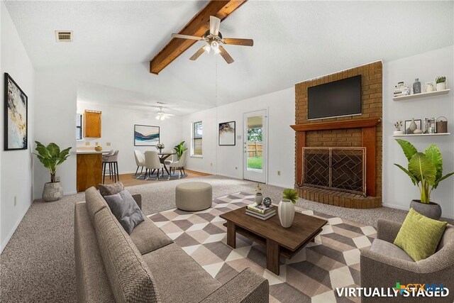 312 Saddle Dr, Copperas Cove, TX 76522 - unfurnished living room with ceiling fan, carpet flooring, and a fireplace