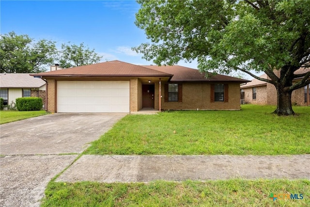 312 Saddle Dr, Copperas Cove, TX 76522 - single story home featuring a garage, brick siding, a front yard, driveway, and a chimney