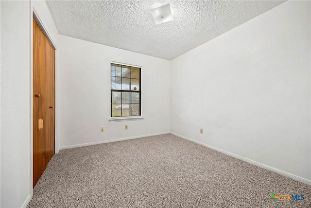 312 Saddle Dr, Copperas Cove, TX 76522 - empty room with carpet flooring and a textured ceiling