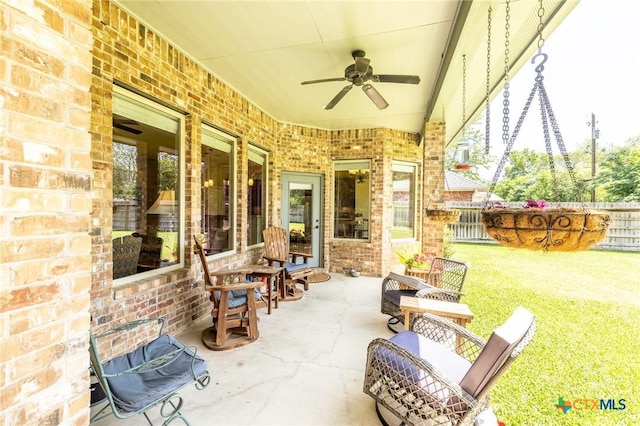view of patio / terrace with ceiling fan and a fenced backyard