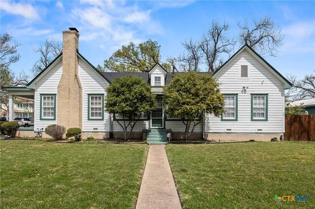505 N 7th St, Temple, TX 76501 - view of front of house with entry steps, crawl space, fence, and a front lawn