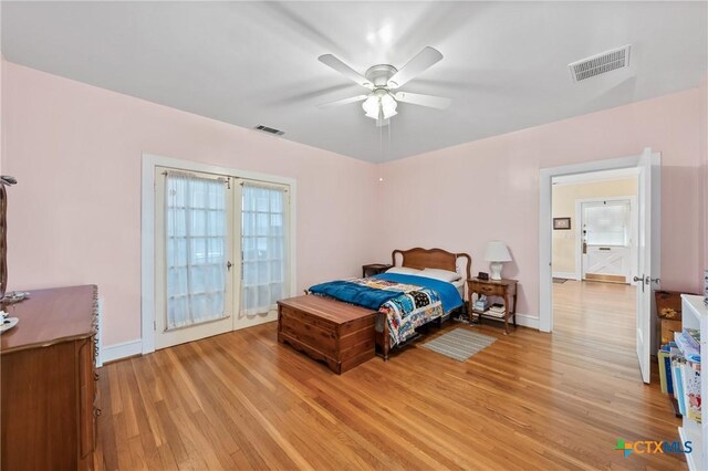 505 N 7th St, Temple, TX 76501 - bedroom featuring french doors, visible vents, and light wood finished floors