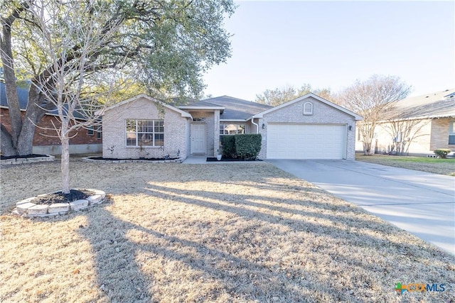 ranch-style house featuring brick siding, concrete driveway, and a garage