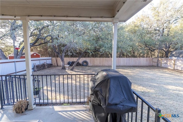 view of patio featuring grilling area and a fenced backyard