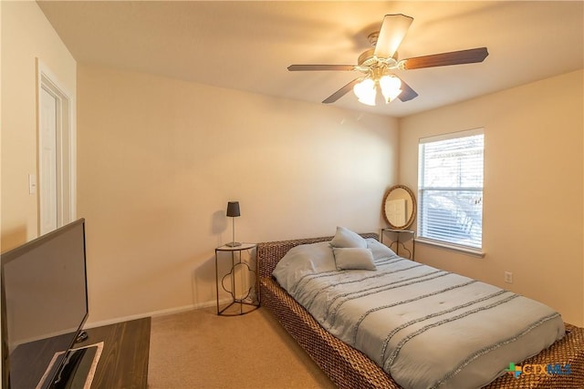 bedroom featuring carpet flooring, baseboards, and ceiling fan