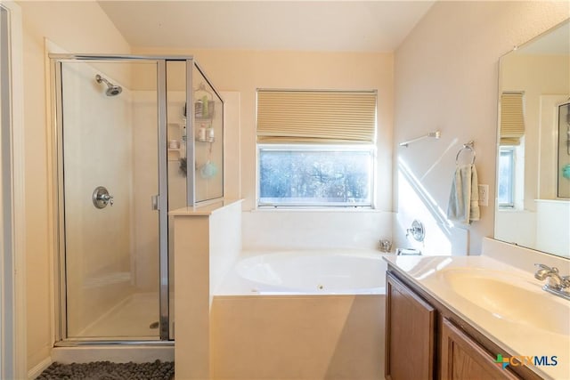 bathroom with a healthy amount of sunlight and a stall shower