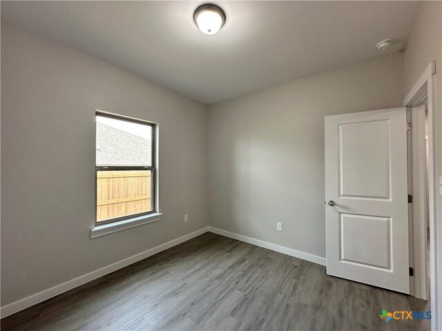 unfurnished room featuring light wood-type flooring