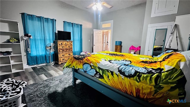 bedroom featuring hardwood / wood-style floors and ceiling fan