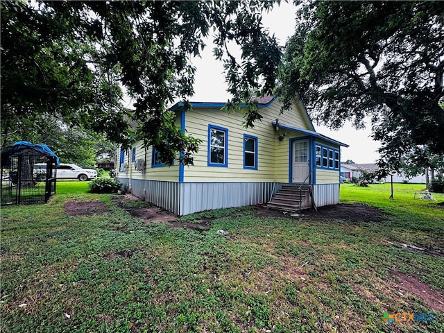 exterior space featuring a lawn