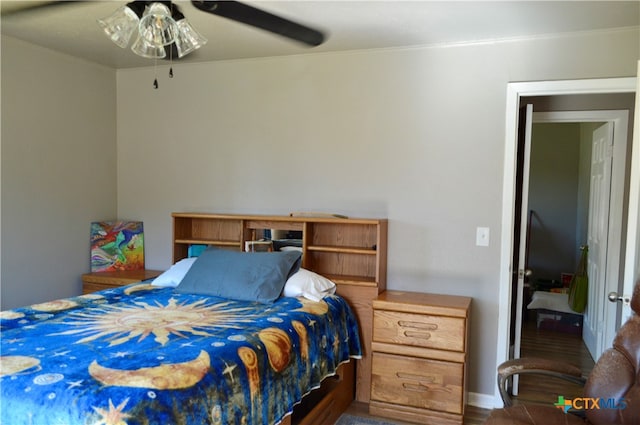 bedroom featuring ceiling fan and wood-type flooring