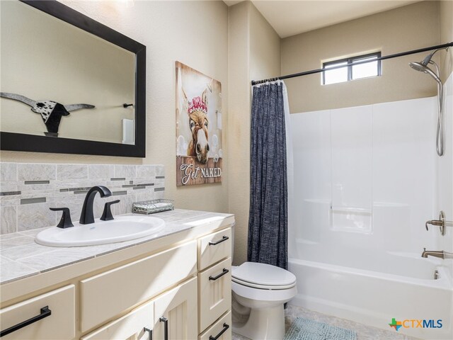 2091 County Road 100, Burnet, TX 78611 - full bathroom with vanity, shower / tub combo with curtain, toilet, tasteful backsplash, and tile patterned flooring